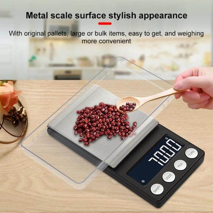 Mini Portable Jewellery Scale For Precise Everyday Weighing showing stainless steel surface weighing small beads with digital display