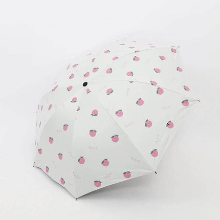 Compact Foldable Sun Umbrella for Daily Outdoor Protection - lightweight white umbrella with pink fruit print, portable for sun and rain