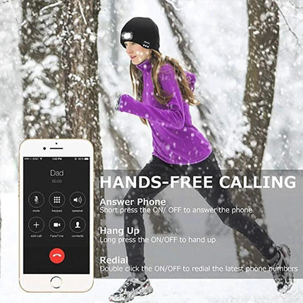Warm Knitted Hat for Evening Outdoor Adventures with Lights - woman jogging in snow wearing LED Bluetooth beanie for hands-free calling