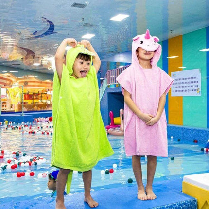 Cotton Cloak Children's Bath Towel 70 cm Pink Unicorn hooded towel on child at indoor pool, soft 100% cotton bath and hair drying cloak