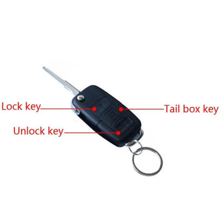 Wireless Car Keyless Entry Remote Control 7-Piece Set showing GM-style black key fob with lock, unlock, trunk buttons and key ring