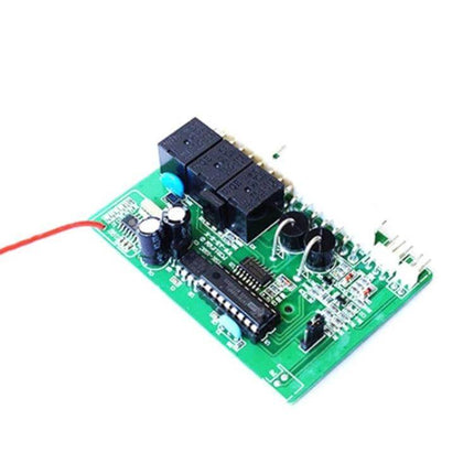 Universal Car Alarm System with Sound, Light, and Dual Remote Control - green circuit board module showing relays, capacitors, and wiring