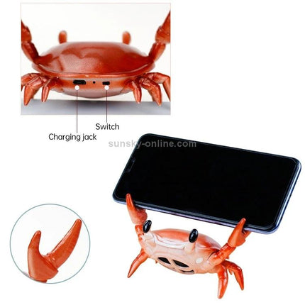 Crab-Style Mobile Phone Stand with Bluetooth Speaker and Pen Holder holding smartphone on desk, crab design with charging jack and switch