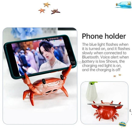 Crab-Style Mobile Phone Stand with Bluetooth Speaker and Pen Holder showing phone held by decorative crab holder on desk