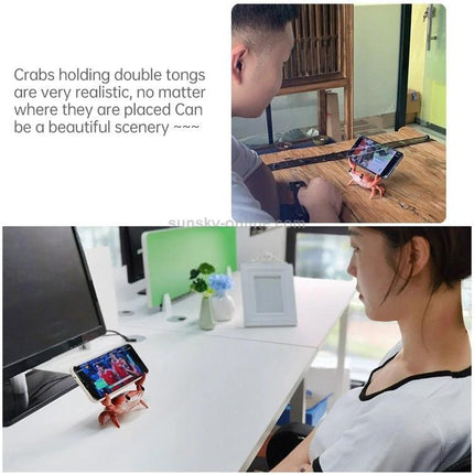 Crab-Style Mobile Phone Stand with Bluetooth Speaker and Pen Holder on desk holding phone for hands-free viewing and audio