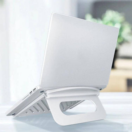 Ergonomic Folding Laptop Stand for Height Adjustment and Cooling, white foldable stand holding a 15-inch laptop, ventilated hollow base