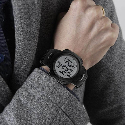SKMEI Men's Waterproof Digital Watch for Everyday Outdoor Use shown on wrist with black durable plastic case and strap