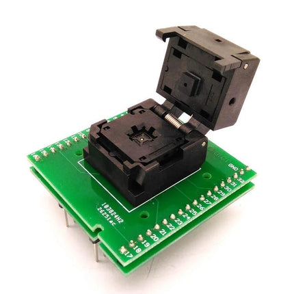 QFN32 Flip Shrapnel Test Socket for IC Programming and Testing mounted on green adapter board for secure chip programming and diagnostic testing