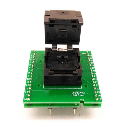QFN32 Flip Shrapnel Test Socket for IC Programming and Testing on green adapter board, open lid showing contact pins