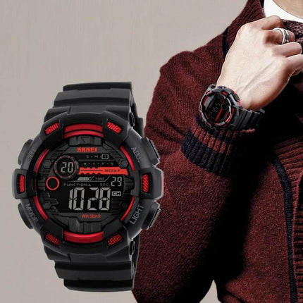 SKMEI Men's Digital Sports Watch for Outdoor Activities black and red digital watch on wrist showing time and rugged waterproof design