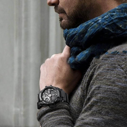 SKMEI Men's Waterproof Sports Digital Watch for Everyday Use worn on wrist of man in sweater and scarf during outdoor casual setting