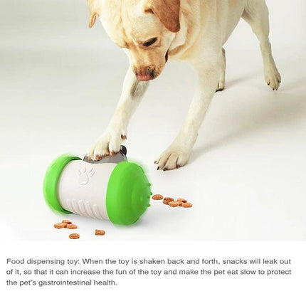 Interactive Balance Toy for Pets During Home Playtime — dog batting wobbling food-dispensing plastic toy that encourages hunting play
