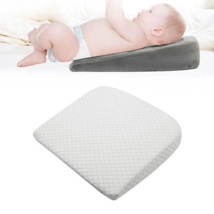 Memory Foam Infant Nursing Pillow Crystal Soft Gray with baby on angled support for feeding and supervised lounging