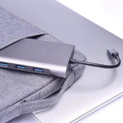 Type-C Multi-Function Docking Station for Charging and Connecting with three USB3.0 ports beside laptop sleeve