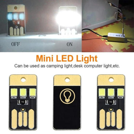 LED Keychain Light for Camping and Desk Use compact USB mini LED keychain light illuminating tent or desk, portable keyring light