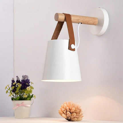 Wooden Wall Lamp for Everyday Bedroom Lighting Needs - Art Deco wood and iron bedside wall lamp casting downward light
