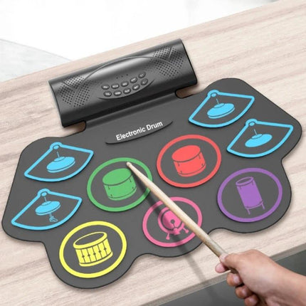 Electronic drum kit for beginner home music practice sessions compact foldable pad with colored drum pads and sticks for quiet apartment practice