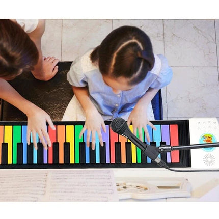 Enjoy music at home with this foldable piano for kids - child practicing colorful foldable piano on table, easy to store and transport