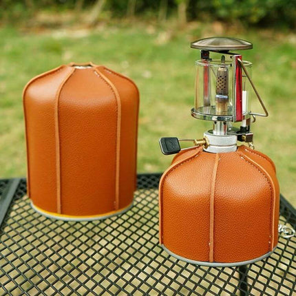 Outdoor PU Gas Tank Protective Cover For 230g And 450g Tanks shown in brown PU on camping gas canisters