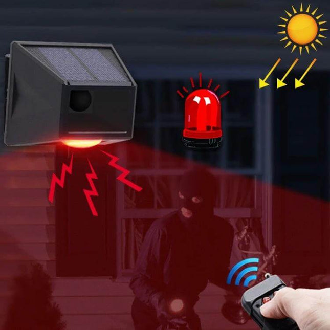 Wireless Solar Motion Sensor Alarm with Sound and Light mounted outdoors showing solar panel, flashing red LED and 129dB alarm deterring intruder