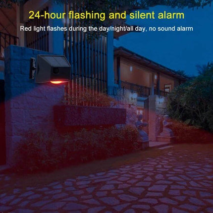 Wireless Solar Motion Sensor Alarm with Sound and Light mounted by a driveway flashing red LED as a 24-hour visual deterrent