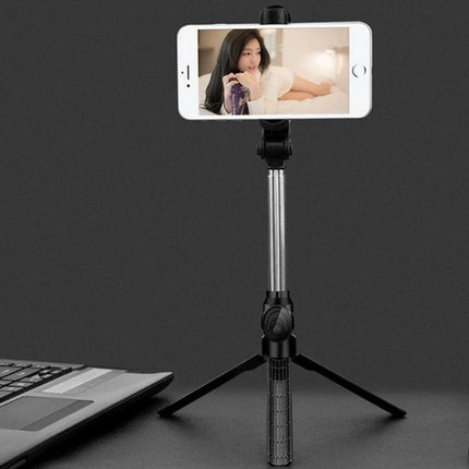Tripod Selfie Stick for Everyday Photos and Group Shots set up on desk holding smartphone for hands-free group and selfie photos