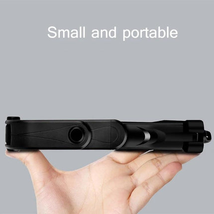 Tripod Selfie Stick for Everyday Photos and Group Shots compact folded view held in hand, small and portable travel tripod