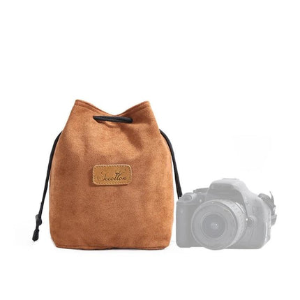 S.C. Cotton Protective SLR Lens Camera Bag with Liner Options shown in brown suede drawstring pouch next to SLR camera for travel protection