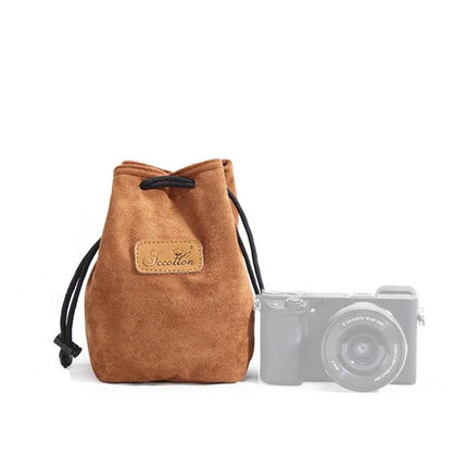 S.C. Cotton Protective SLR Lens Camera Bag with Liner Options in brown suede drawstring pouch beside compact camera