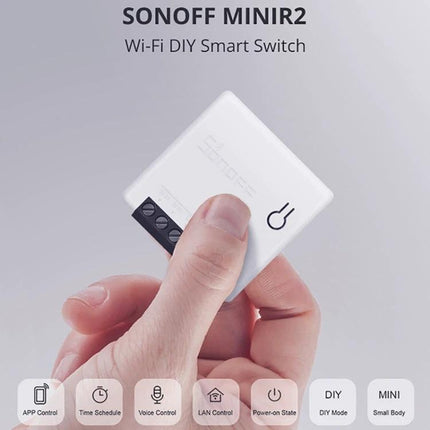 Sonoff Dual-Control WiFi Smart Switch for Home Automation Control compact DIY Wi‑Fi module held between fingers, app and voice control features