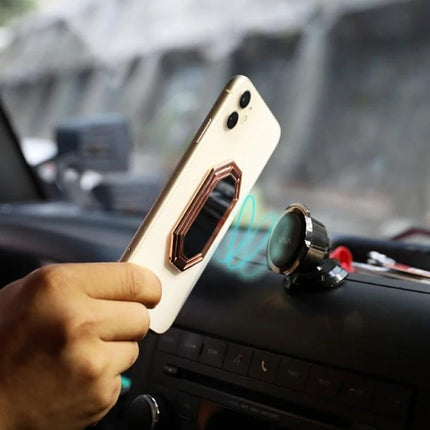 Magnetic Zinc Alloy Phone Ring Holder for Cars and Daily Use showing phone magnetically attaching to car dashboard mount for hands-free navigation and video