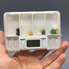 Pastillero portátil de plástico con recordatorio inteligente y temporizador de 4 celdas TF200