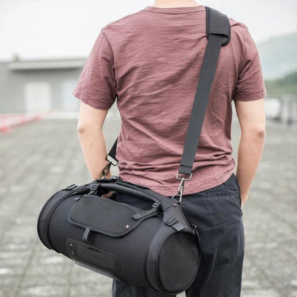 JBL Boombox Padded Carry Bag For Everyday Outings And Travel shown slung over shoulder for park