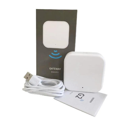 Wireless App-Controlled Smart Gateway for Home Security - compact white gateway device with USB cable and manual