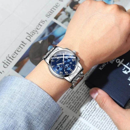 FNGEEN Men's Waterproof Quartz Watch for Everyday Timekeeping on wrist with blue dial and stainless steel band, 30m water resistance, casual look