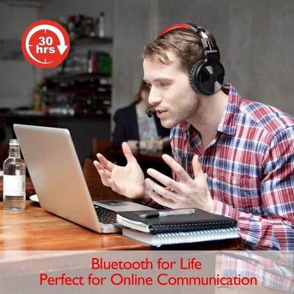 OneOdio Bluetooth Over Ear Headset Wired And Wireless Black Red worn by man on laptop for gaming and online meetings