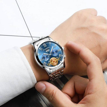 FNGEEN Multi-Function Men's Quartz Watch for Everyday Use - silver bracelet blue dial wristwatch with calendar and multi-function subdials