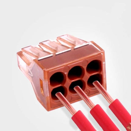 VSELE Four-Hole Terminal Block for Wire Connections shown with three red-insulated wires plugged into the four-hole plug-in connector