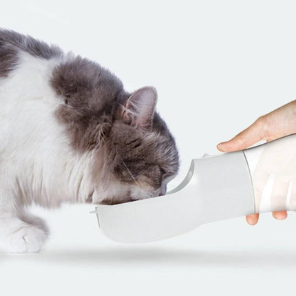 Convenient Pet Food and Water Cup for Daily Outings - segmented travel bowl shows cat drinking from compact cup