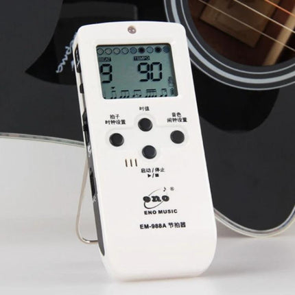 ENO Electronic Metronome for Everyday Music Practice at Home - white ENO EM-988A metronome on desk beside acoustic guitar showing 90 BPM