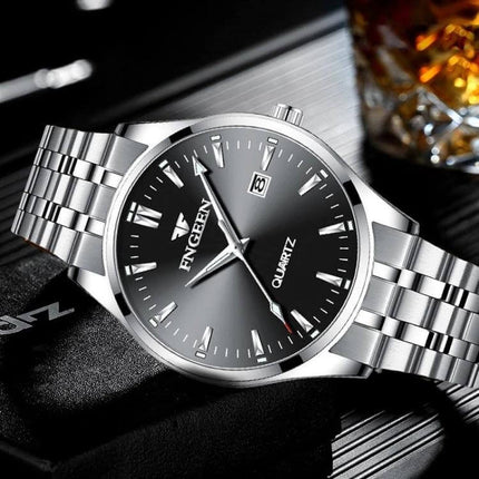 FNGEEN Men's Luminous Calendar Watch for Everyday Use - stainless steel silver quartz watch with black dial and date window, luminous hands for low-light visibility