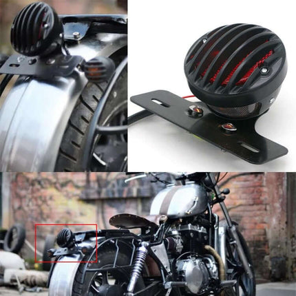 Retro Motorcycle Tail Light with Red Brake Indicator mounted on vintage motorcycle, metal shell and PC lens for improved visibility