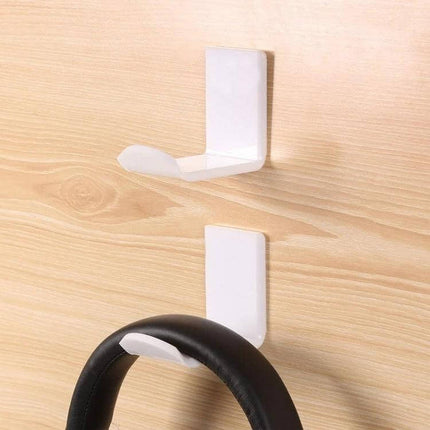 Adhesive Headphone Hanger Bracket For Wall Or Desk Storage - white L-shaped acrylic holder mounted on wood