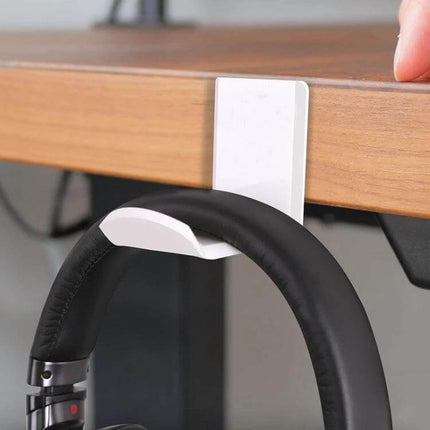 Adhesive Headphone Hanger Bracket For Wall Or Desk Storage mounted under desk holding over-ear headphones neatly
