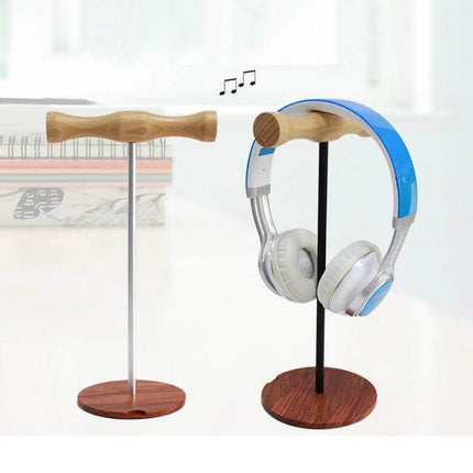 Beech Wood Headphone Stand With Metal Base For Desk displayed holding over-ear headphones on a tidy desk