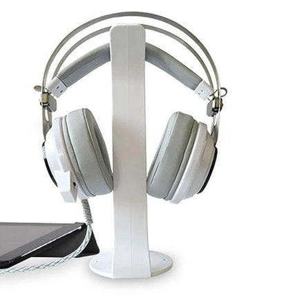 Universal Headphone Holder For Desk Or Wall Mount White And Black with silicone pads on desk showing white over-ear headset