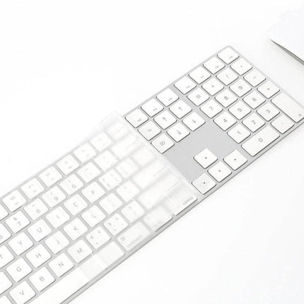 Transparent TPU Protective Film for iMac 2017 Magic Keyboard shown partially applied on keyboard to protect against dust and spills