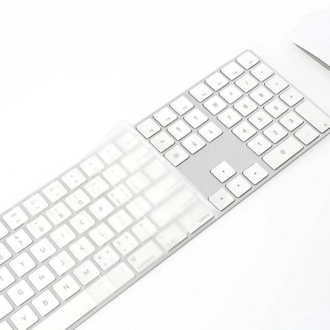 Transparent TPU Protective Film for iMac 2017 Magic Keyboard shown partially applied on keyboard to protect against dust and spills
