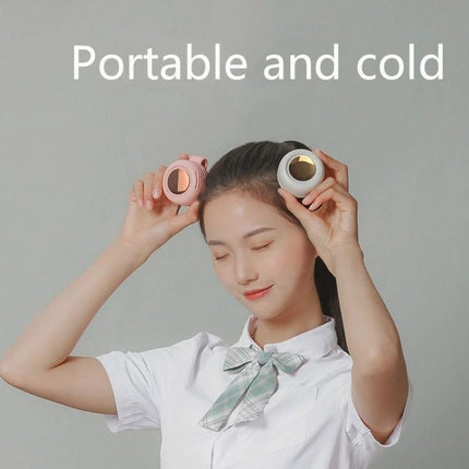 Small Portable Leafless Clip Waist Fan for On-the-Go Cooling clipped to waist with girl holding two compact fans, 360-degree adjustable airflow