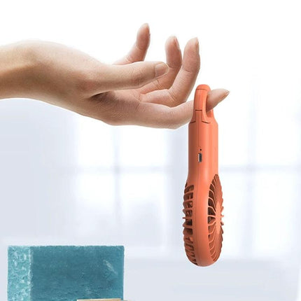 Compact Portable Handheld Mini Fan with USB Charging and LED Lights - lightweight orange handheld fan being held by hand, pocket-sized 75g